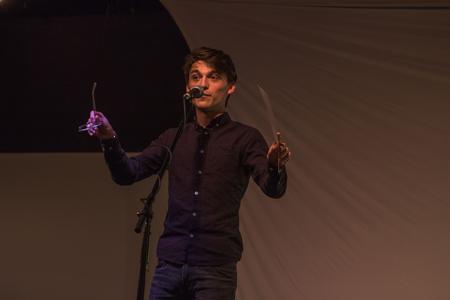 Campbell Padgett, sophomore psychology major, gives an acceptance speech after receiving the Best Overall Film award at the Student Film Festival.  - Photo by Morgan Morfe
