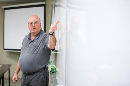 Bryan Dawson, professor of mathematics, teaches class.  - Photo by Kristi McMurry Woody