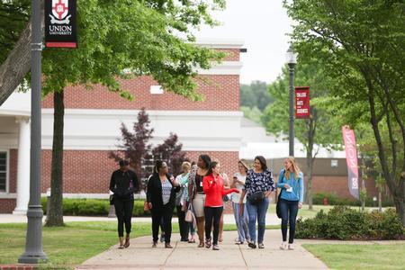 Prospective students and their families go on a tour of campus during Day at the U. - Photo by Kristi McMurry Woody