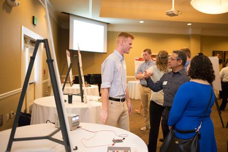 Ethan Morris, sophomore engineering major, presents his project during the Scholarship Symposium. - Photo by Kristi McMurry Woody