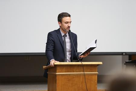 Jason Crawford, assistant professor of English, reads an excerpt from his book "Allegory and Enchantment: An Early Modern Poetics."
 - Photo by Kristi McMurry Woody