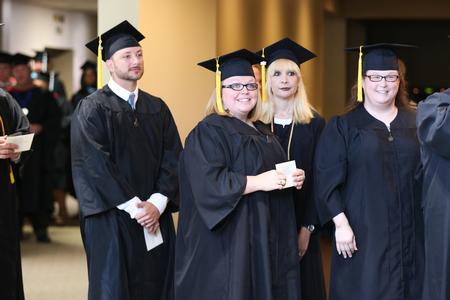 Graduates line up outside the West Jackson Baptist Church sanctuary in preparation for summer commencement.  - Photo by Kristi McMurry Woody