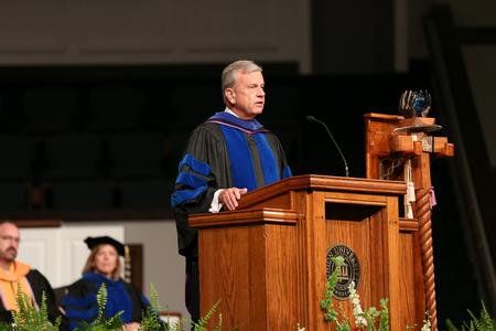 Walton Padelford, retired Porter Family Professor of Business and Economics, delivers the commencement address. - Photo by Kristi McMurry Woody