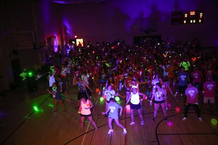 New students dance during the "It's About to Glo Down" event during Welcome Week.  - Photo by Kristi McMurry Woody