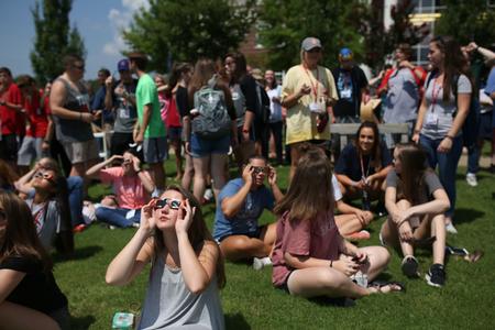 Students gather on the Great Lawn to view the solar eclipse. This eclipse reached 96% totality over Union. - Photo by Kristi McMurry Woody