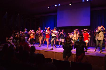 Welcome week leaders participate in the Welcome Week Show in the Savage Memorial Chapel. - Photo by Gretchen Foels