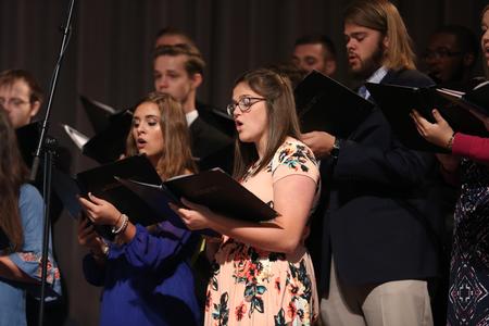 Members of the University Singers perform a piece during Convocation. - Photo by Kristi McMurry Woody