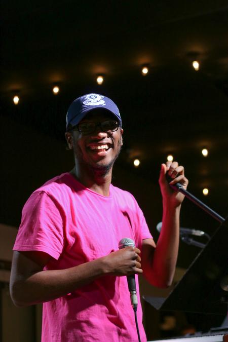 Cedric Davis sings to Stevie Wonder during open mic night at Barefoots Joe. - Photo by Hannah Heckart