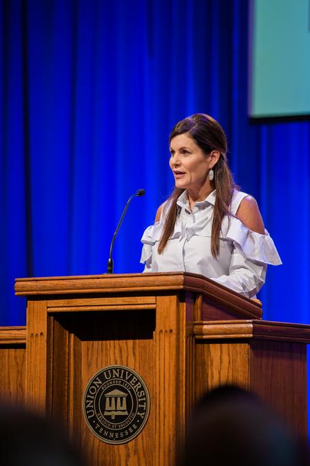 Susie Oliver, first lady of the university, introduces Kay Arthur in chapel. - Photo by Kristi McMurry Woody