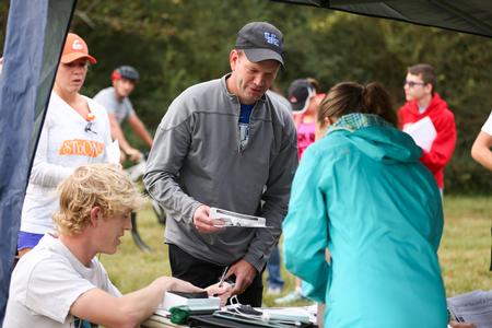 Students and their families sign up for the 5k on the Union Trails during Family Weekend.  - Photo by Kristi McMurry Woody