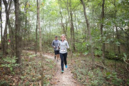 The Estes family participates in the Union Trails 5K run during Family Weekend. - Photo by Kristi McMurry Woody
