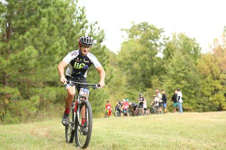 Families and community members participate in a mountain bike race on the Union Trails during Family Weekend.  - Photo by Kristi McMurry Woody