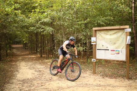 A rider participates in the Family Weekend mountain bike ride on the Union Trails. - Photo by Kristi McMurry Woody