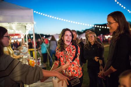 Anna Guthrie, art studio major, checks out the chemistry booth during Union Night.  - Photo by Kristi McMurry Woody