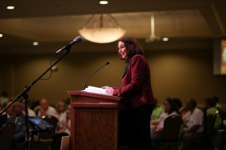 Theresa Blakley, professor of social work, addresses guests of the Remember Me Commemorative Walk for Homicide-Loss Survivors. - Photo by Kristi McMurry Woody