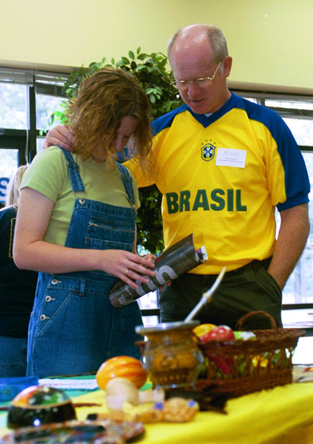 A Brazilian missionary prays with Sophomore Christian Studies major Sarah Bradley for direction and where God would have her to serve. - Photo by Amanda Smith