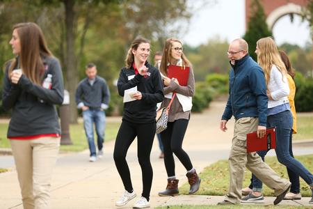 Olivia Johnston, social work major, gives a tour to prospective students and their families during Bulldog Days. - Photo by Kristi McMurry Woody