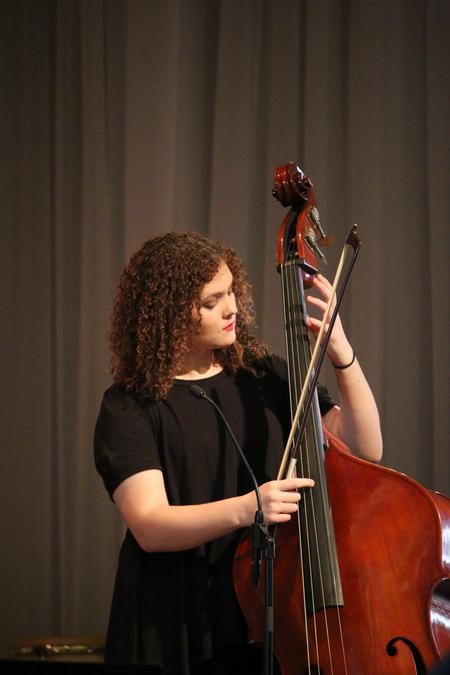 Jordan Crawford, music major, performs during A Christmas Gift to the Community chapel. - Photo by Hannah Heckart