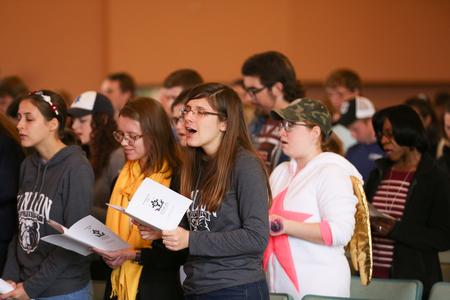 Students participate in a hymn sing service in the chapel. - Photo by Kristi McMurry Woody