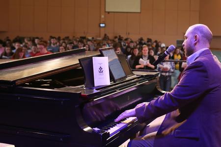 Scott Shepherd leads students in singing hymns during chapel. - Photo by Kristi McMurry Woody