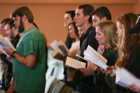 Students sing together during a chapel hymn singing. - Photo by Kristi McMurry Woody
