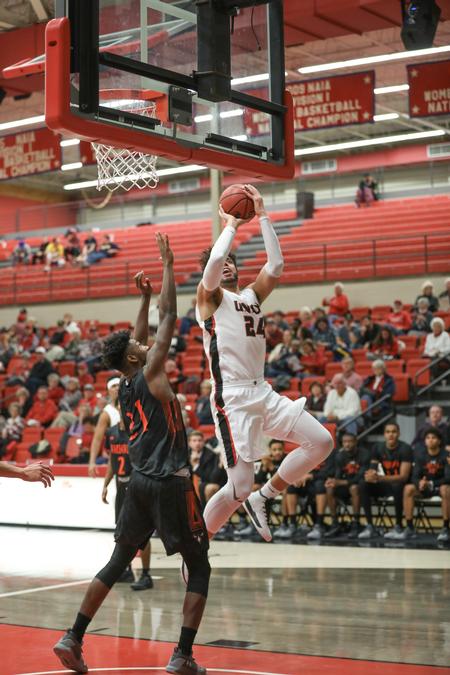 Pedro Da Silva goes up for a shot during a game in the Fred Delay Gymnasium. - Photo by Kristi McMurry Woody