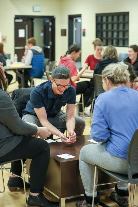 Joseph Wunrow, junior music major, plays in the Residence Life Bunco tournament during January term.  - Photo by Kristi McMurry Woody