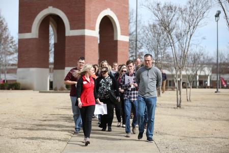 Anna Claire Sewell, enrollment counselor, leads a tour of campus during Day at the U. - Photo by Kristi McMurry Woody