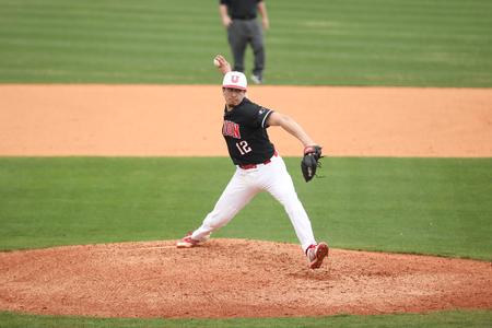 Luis Larrinaga pitches against Harding University. - Photo by Kristi McMurry Woody