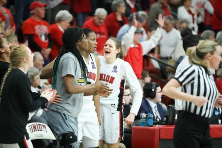 The Lady Bulldogs celebrate their win, which pushed them to the Sweet Sixteen in the NCAA DII tournament. - Photo by Kristi McMurry Woody