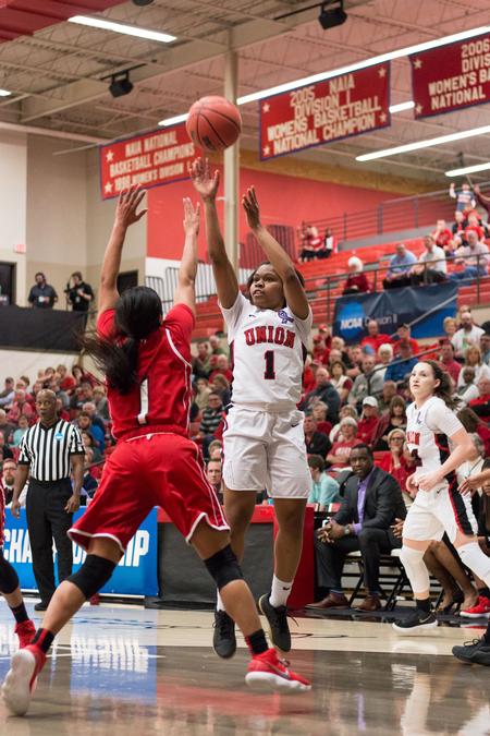 Jada Perkins goes up for a shot during a game in the Fred Delay gymnasium. - Photo by Gretchen Foels