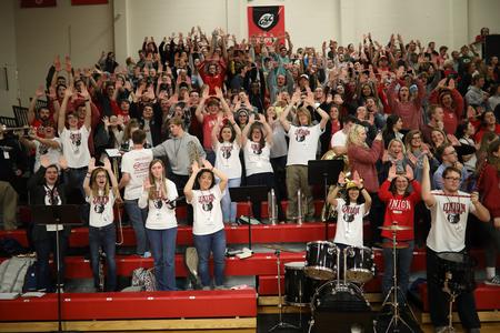 Union students and the pep-band make the UU sign after the Lady Bulldogs beat Valdosta State to advance to the Elite Eight. - Photo by Kristi McMurry Woody