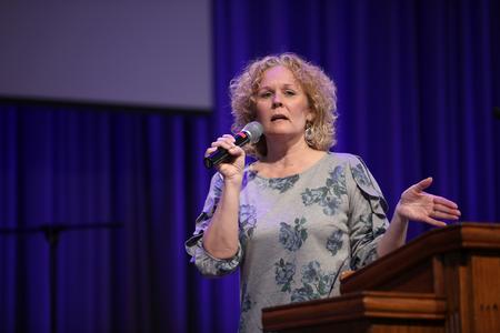 Pam Neu, teacher at Christian Academy of Knoxville, speaks in chapel. - Photo by Kristi McMurry Woody