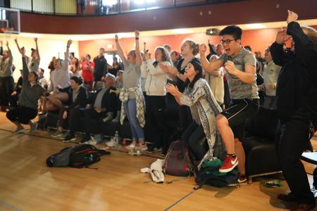 Students react to the big win by the Lady Bulldogs during the simulcast of the Elite Eight game in the NCAA DII tournament. They advanced to the Final Four. - Photo by Kristi McMurry Woody