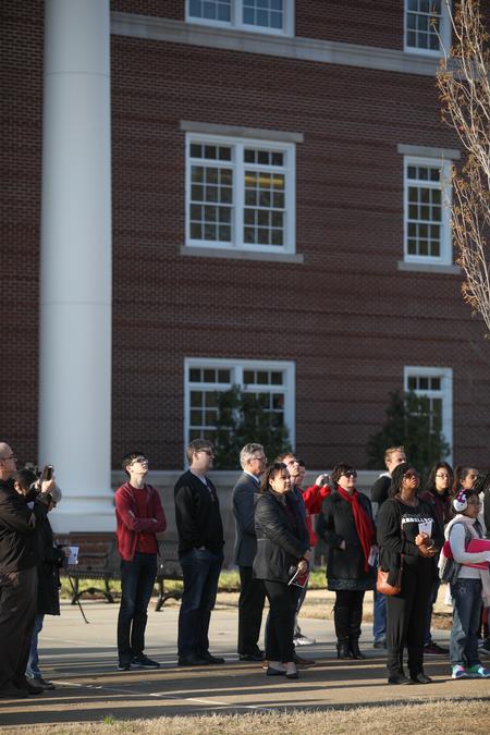Guests listen as the bells chime in honor of Martin Luther King Jr. on the 50th anniversary of his assassination.  - Photo by Kristi McMurry Woody