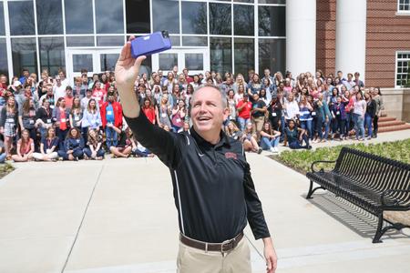 Dub Oliver, president of the university, takes a selfie with future students during Accepted Student Day. - Photo by Kristi McMurry Woody