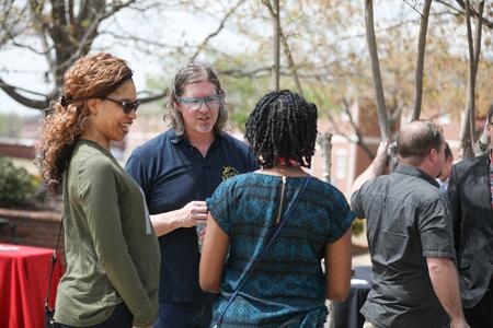 Ted Kluck, assistant professor of communication arts, speaks with a prospective student during Accepted Student Day. - Photo by Kristi McMurry Woody