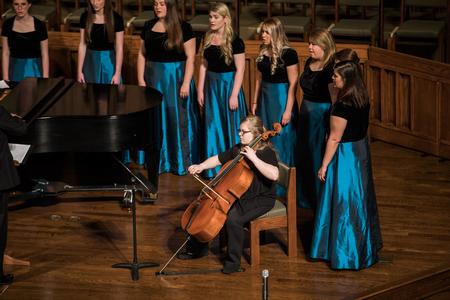 Lanna Atkins, cellist, accompanies Cantilena in their performance of "My November Guest" during the Spring Choral Concert. - Photo by Kristi McMurry Woody