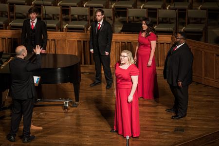 Sallie Norman, music education major, sings with The Voices of Proclamation during the Spring Choral Concert. - Photo by Kristi McMurry Woody