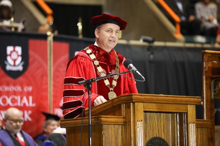 Dub Oliver, president of the university, welcomes guests to the spring commencement services.  - Photo by Kristi McMurry Woody
