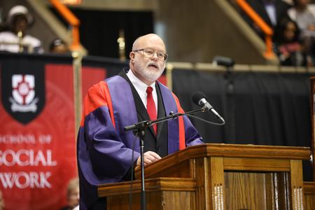 Daniel Driesbach, professor at American University in Washington, D.C., delivers the commencement address during spring commencement services.  - Photo by Kristi McMurry Woody