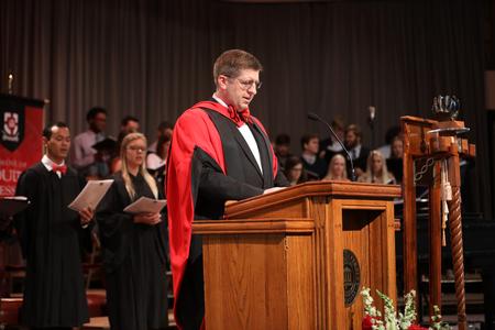 Ray Van Neste, dean of the School of Theology and Missions, leads the Fall Convocation audience in The Apostles' Creed. - Photo by Kristi McMurry Woody