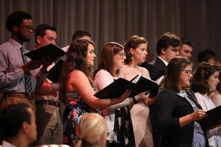 The Union University Singers help lead the congregation in a song during Fall Convocation. - Photo by Kristi McMurry Woody