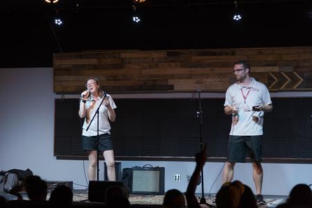 Abigail Johnson, music education major, and Austin Maddox, public relations major, perform during Welcome Week open mic night.  - Photo by Riley Boggs