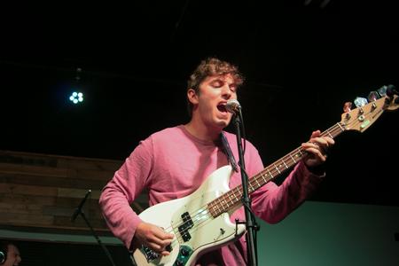 Arlie performs for a crowd of students in Barefoots Joe.  - Photo by Hannah Heckart