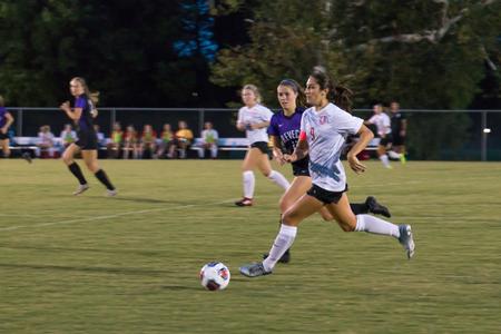 Brooke Watson takes the ball downfield during a soccer game against Trevecca Nazarene. - Photo by Lynn Tucker