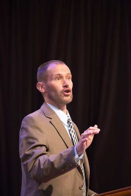 Dan Musselman, associate professor of music, leads worship in chapel. - Photo by Hannah Heckart