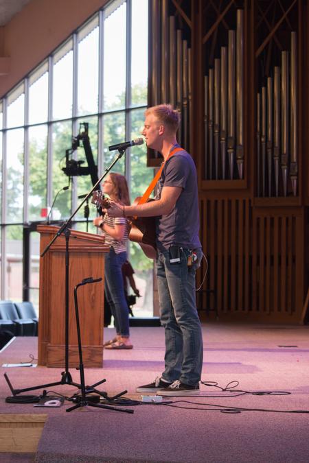 The UWorship team leads the chapel audience in a song.  - Photo by Hannah Heckart
