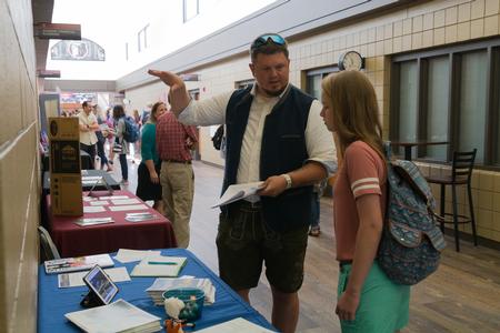 Students learn about various opportunities during the Study Abroad Fair in the SUB. - Photo by Lynn Tucker