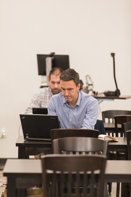 Jason Crawford, associate professor of English, works in the Writing Center during Faculty Writing Hour. - Photo by Kristi McMurry Woody
